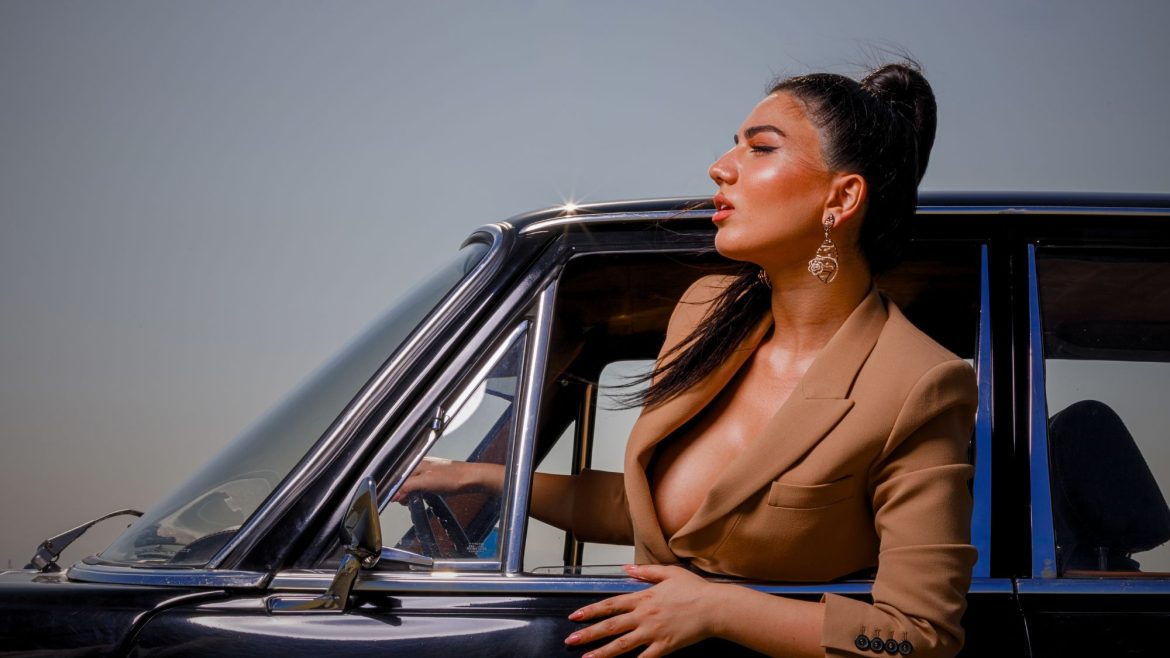 A celebrity coming for red carpet events in her luxury car
