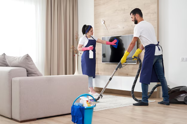 Professional cleaners maintaining a spotless office environment.
